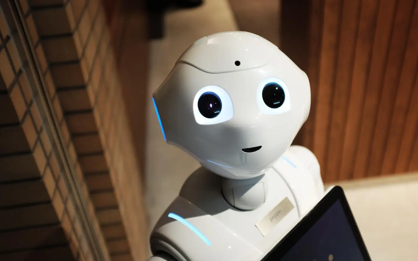 A robot looking at front with a happy face