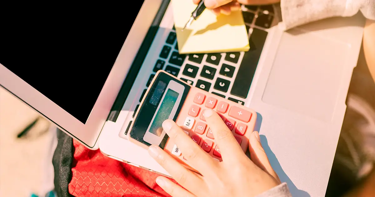 Etsy seller calculating product pricing and profit