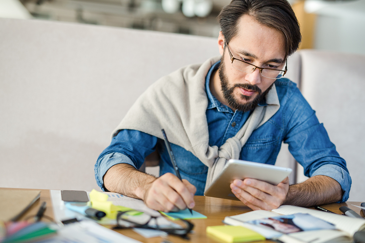 How to Price Handmade Products: A Simple Formula That Includes All Your Costs 2 Handmade business owner calculating product costs