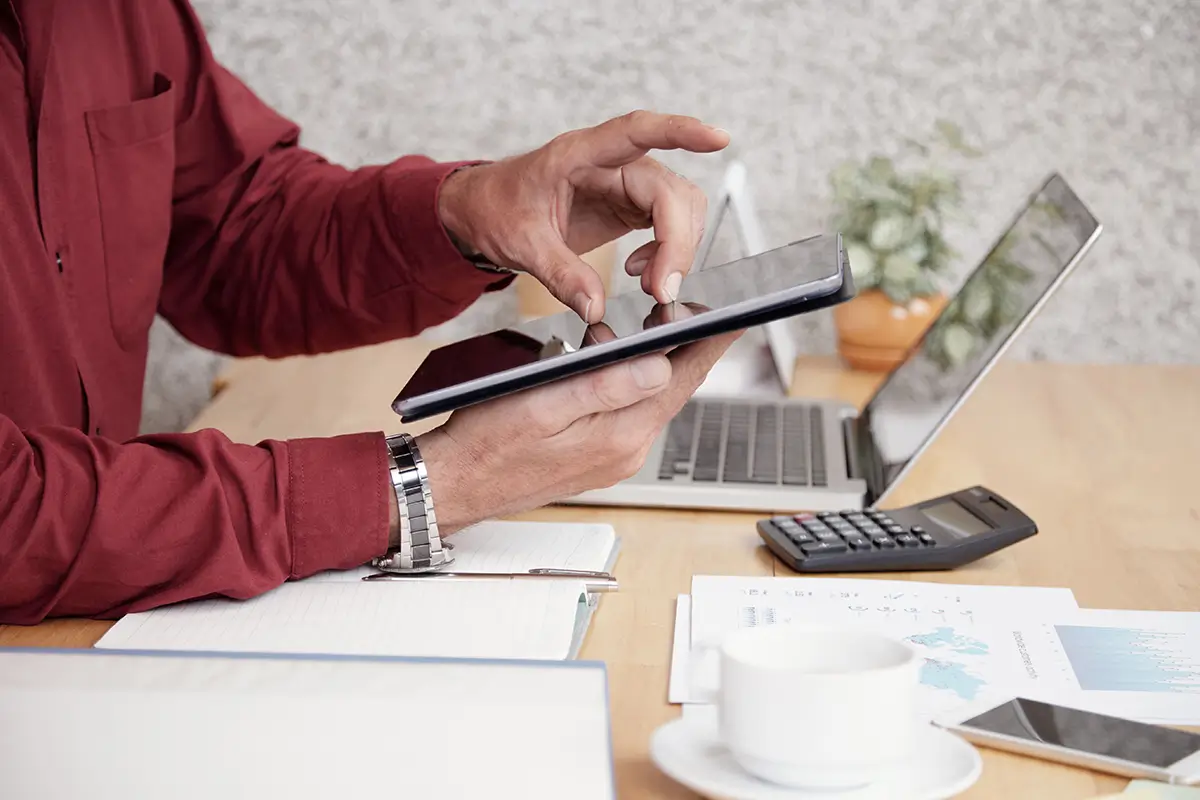 Business owner reviewing a weekly cash flow forecast